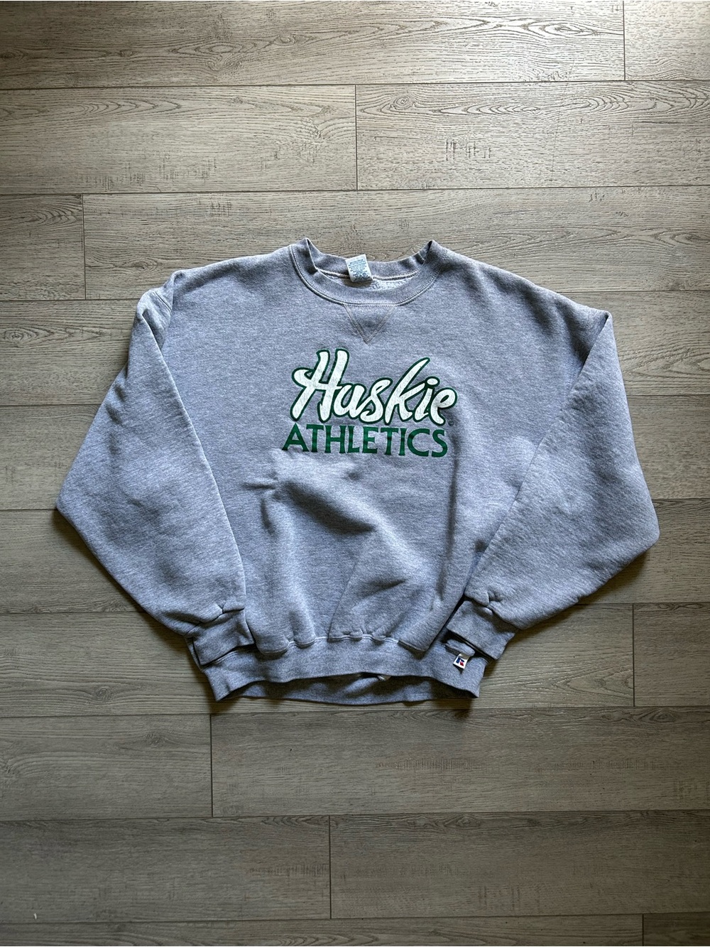 Russell Athletic Gray Crewneck Sweatshirt with Green Huskie Athletics Logo